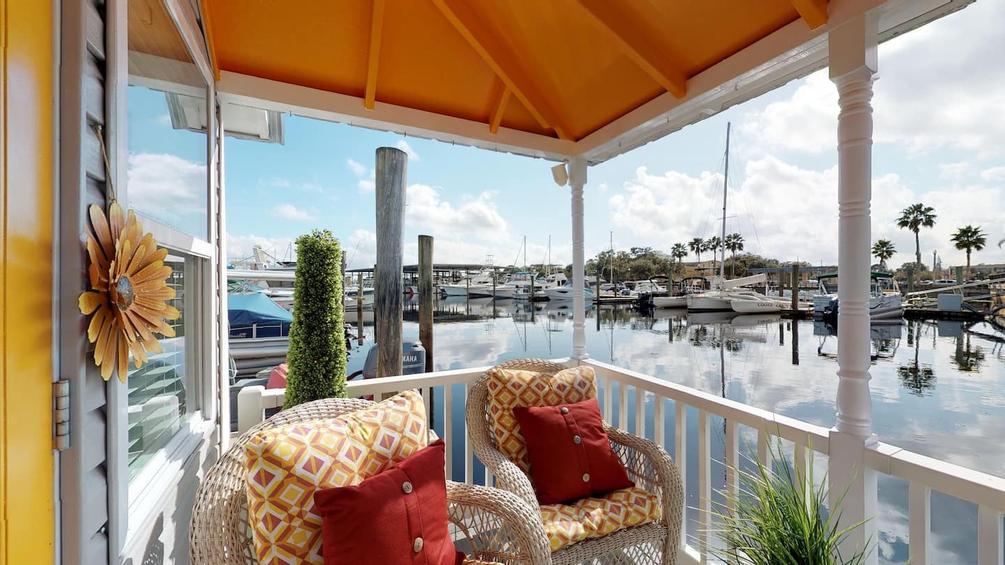 Porch and river view from The Famous Houseboat